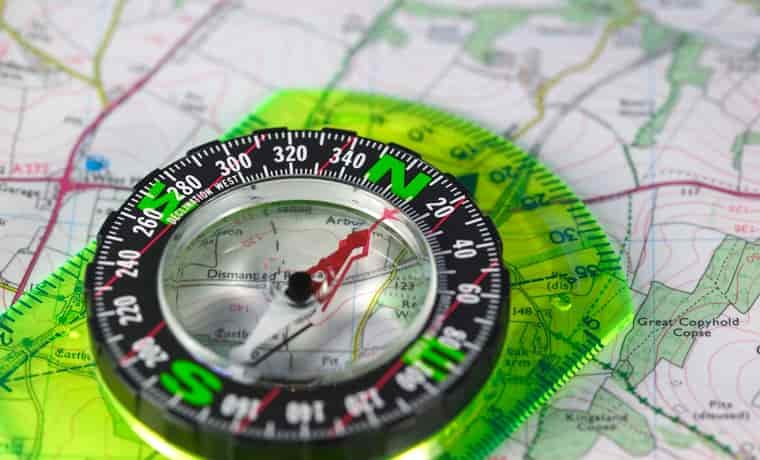 Compass on map