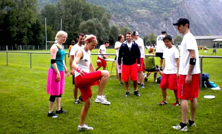 Group of people playing hacky sack