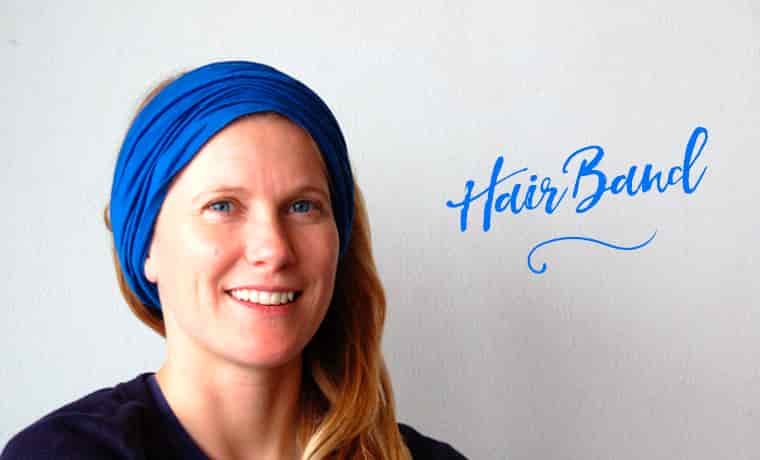 Woman wearing a Buff as a head band