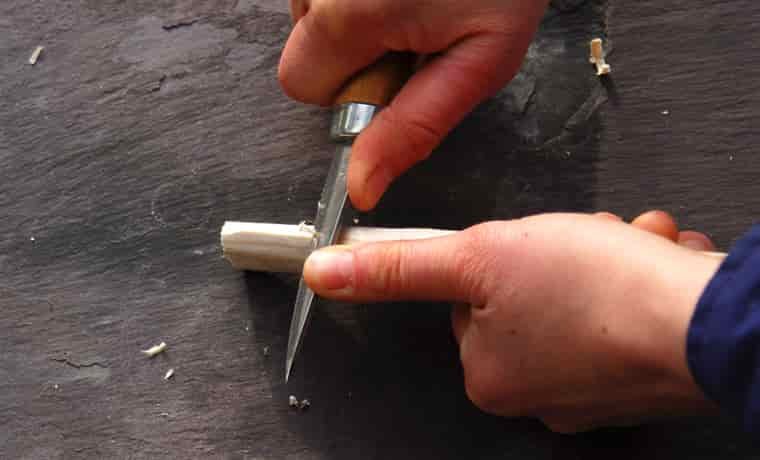 Whittling thumb push stroke