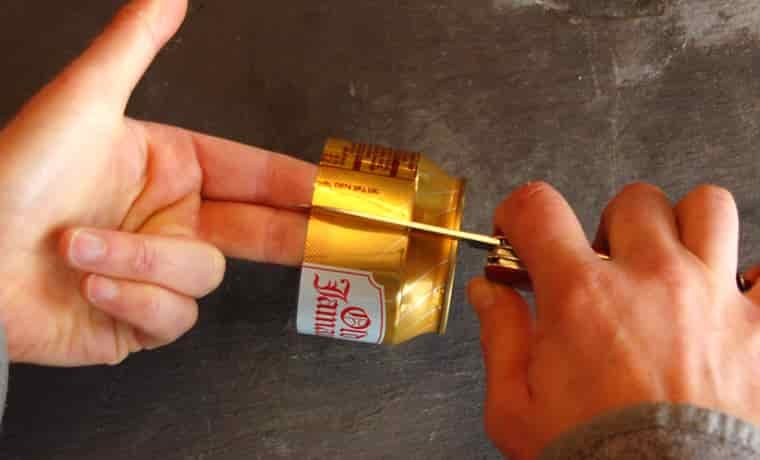 Folding a soda can with a knife