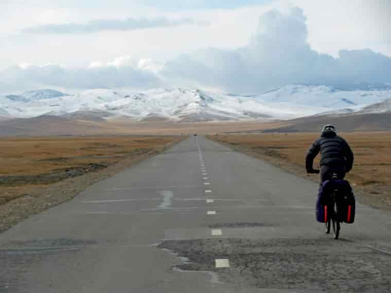 Cycler in Mongolian mountains