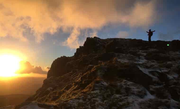 A sunrise hike on a mountain