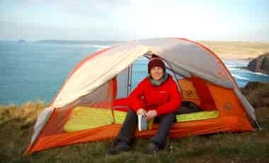 Woman sitting in tent