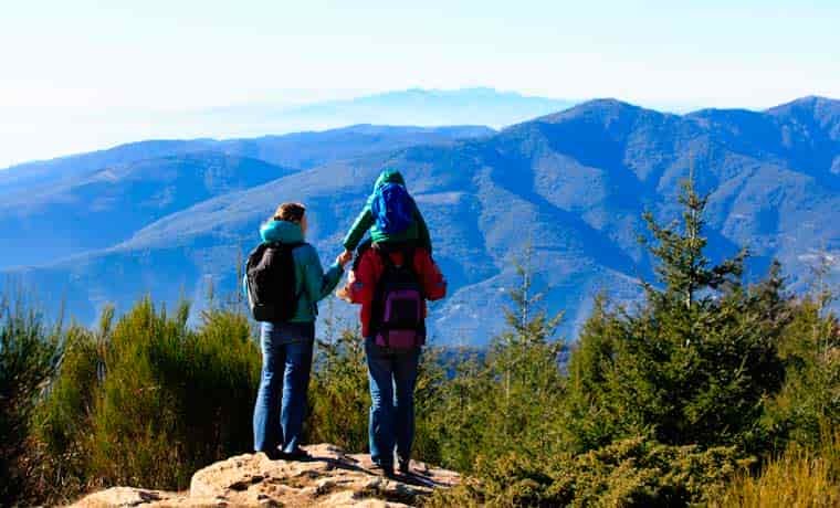 Family admiring mountain view