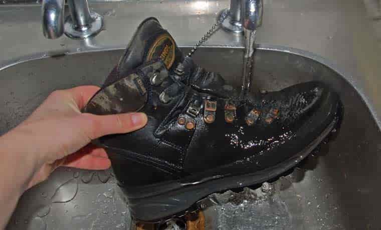 Rinsing boots in sink