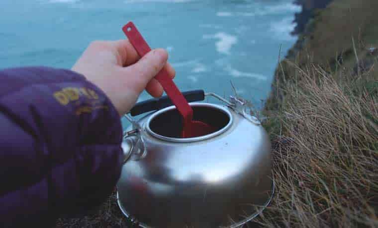 Stirring coffee in pot