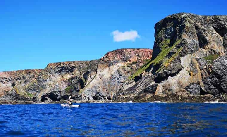 Paddling next to cliffs