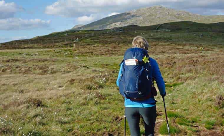 Woman trekking in hills