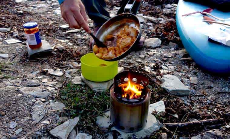 Cooking dinner on wood burning stove