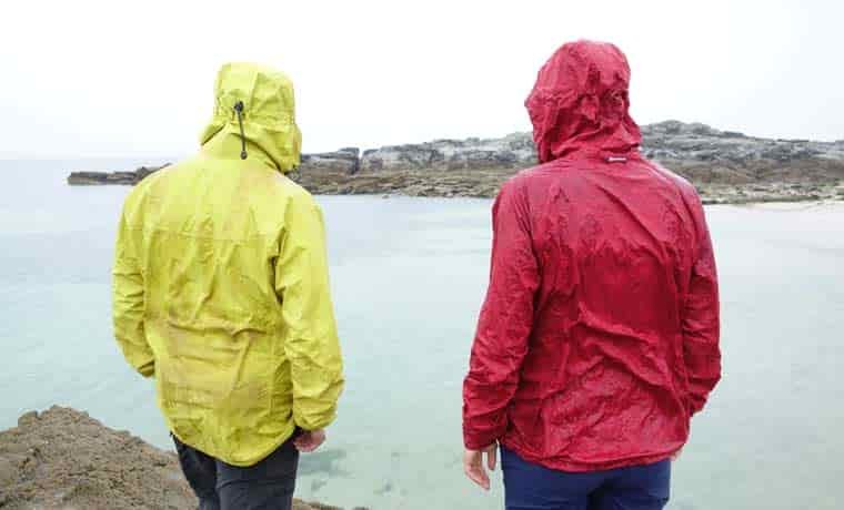 People standing in the rain