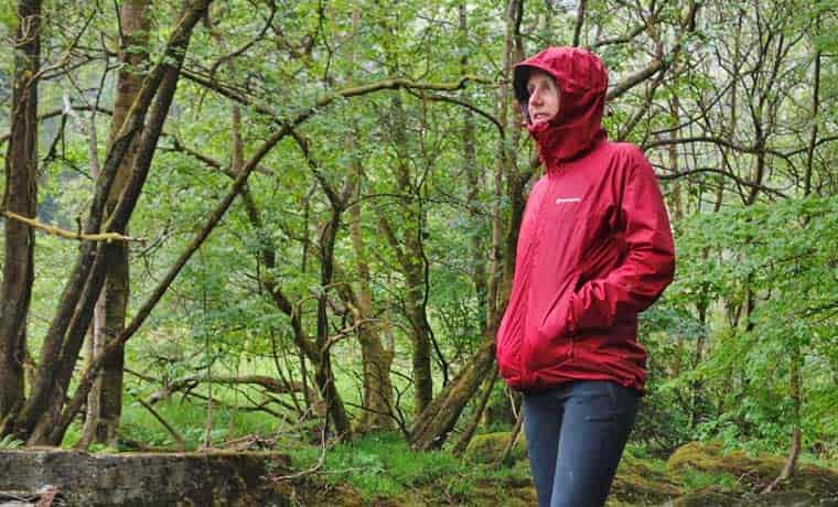 Woman in rain jacket with hood