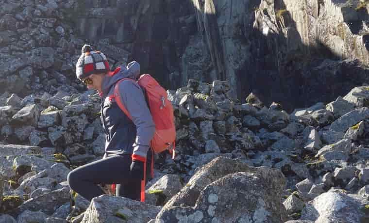 Woman walking in rocks
