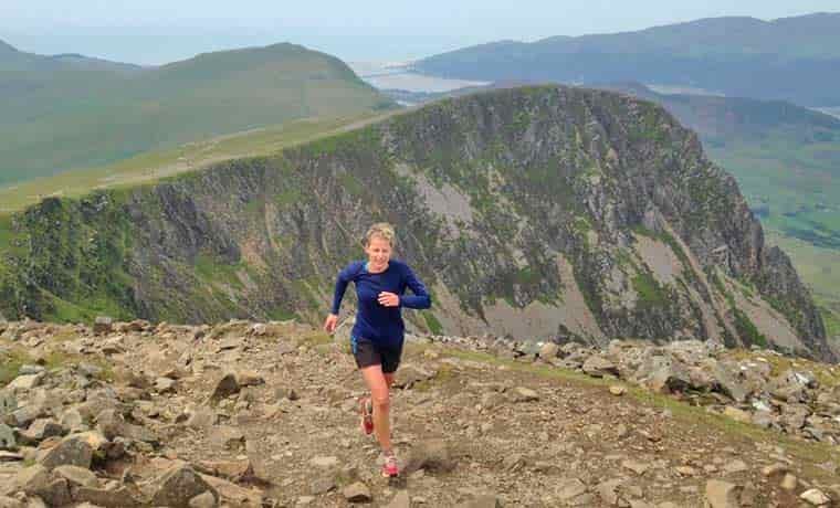 Woman running in mountains