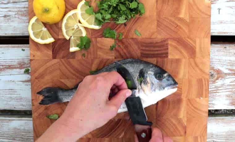 Cutting fish on board