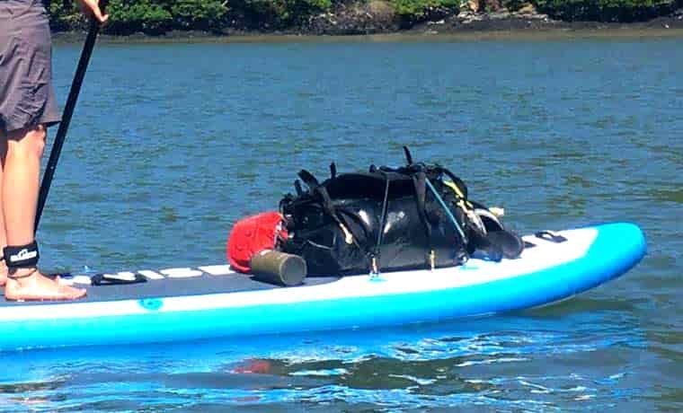 Gear on paddle board