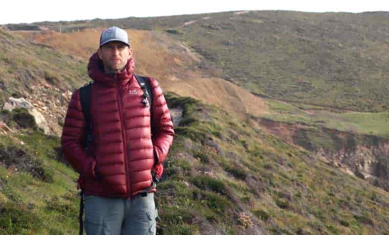 Man hiking in down jacket