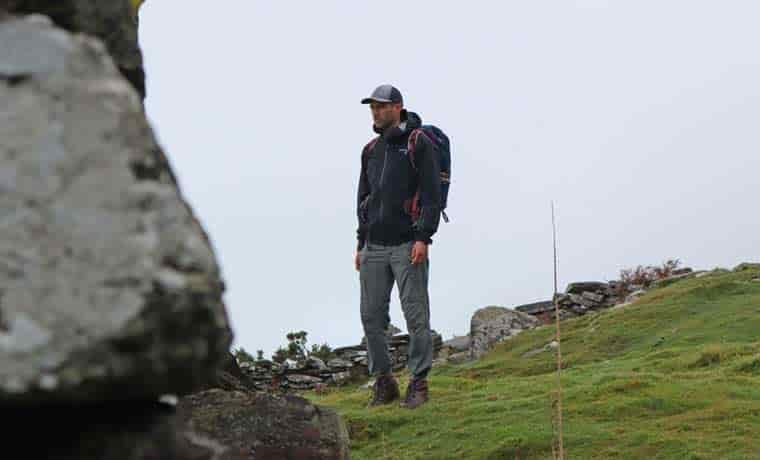 Man standing by wall