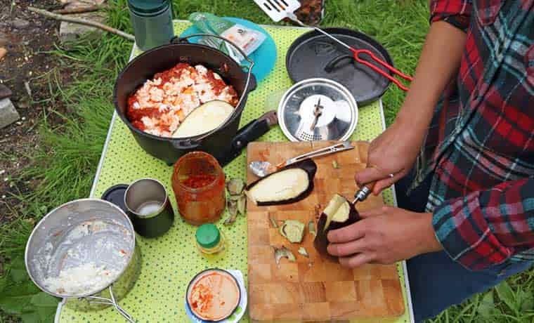 Preparing campfire lasagna