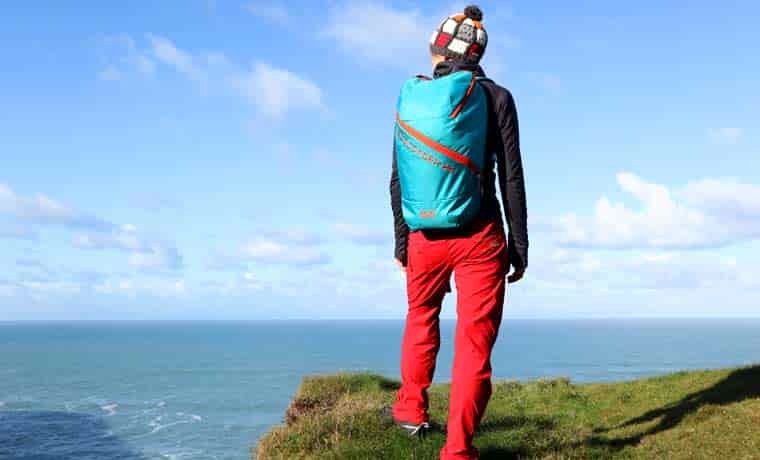 Hiker by the coast