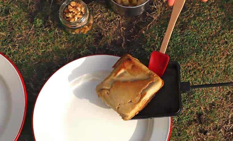 Placing pie iron pancake on plate