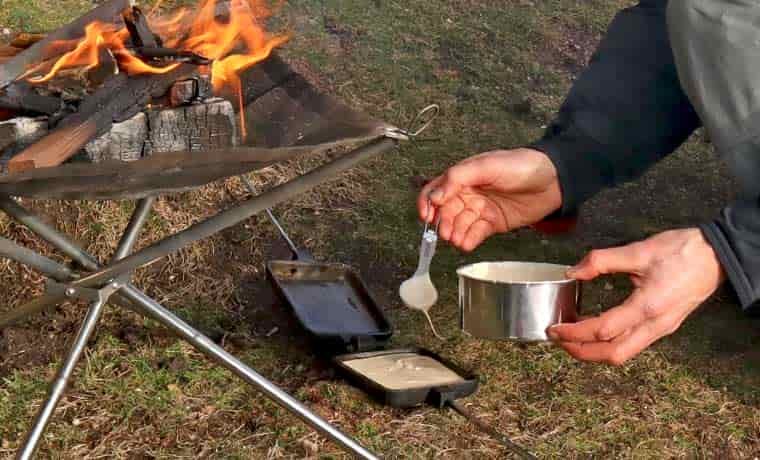 Preparing pie iron pancakes