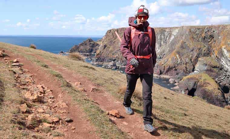 Woman hiking along the clffs