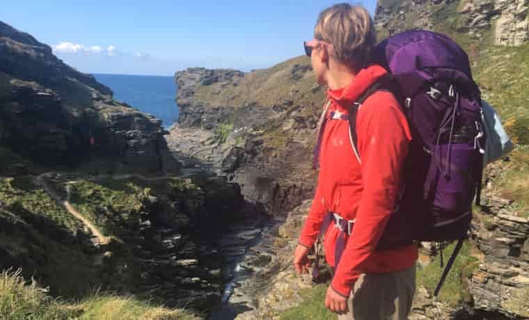 Hiker looking out over the sea
