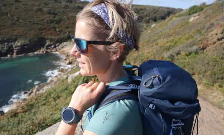 Woman adjusting backpack