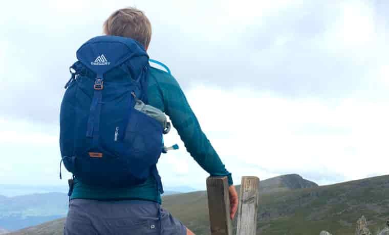 Woman hiking with day pack