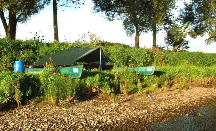 Canoe camping by the river