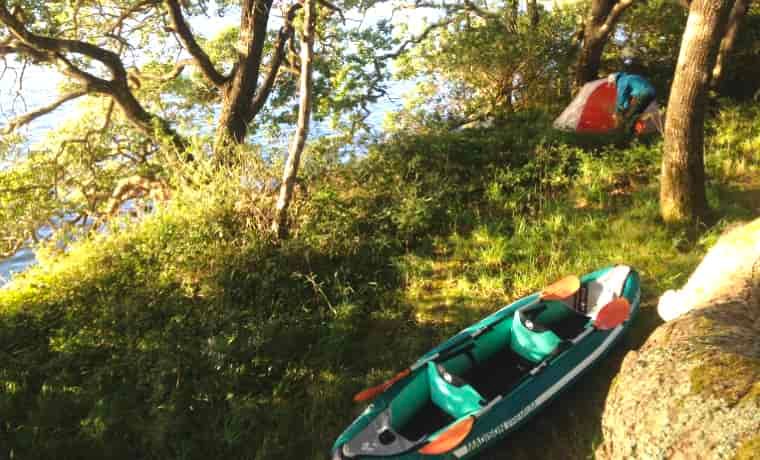 Canoe next to tent