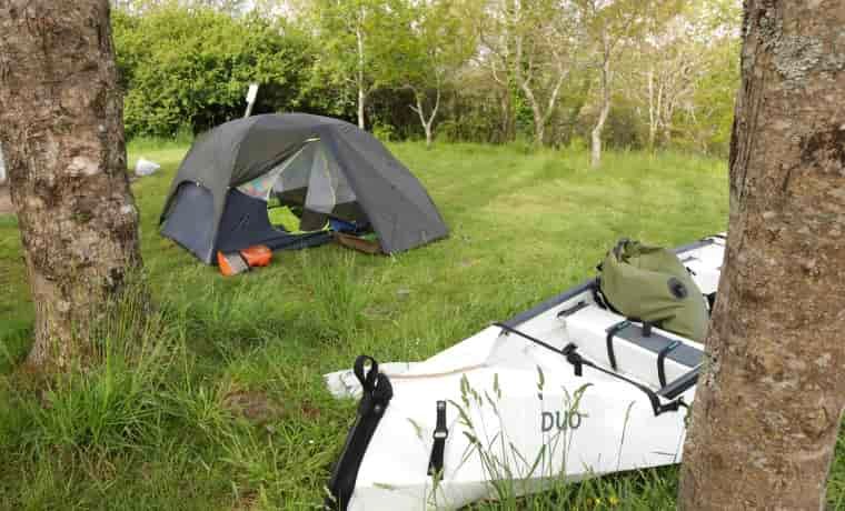 Tent next to canoe