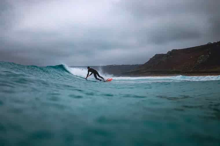 Surfer at Sennen in Cornwall