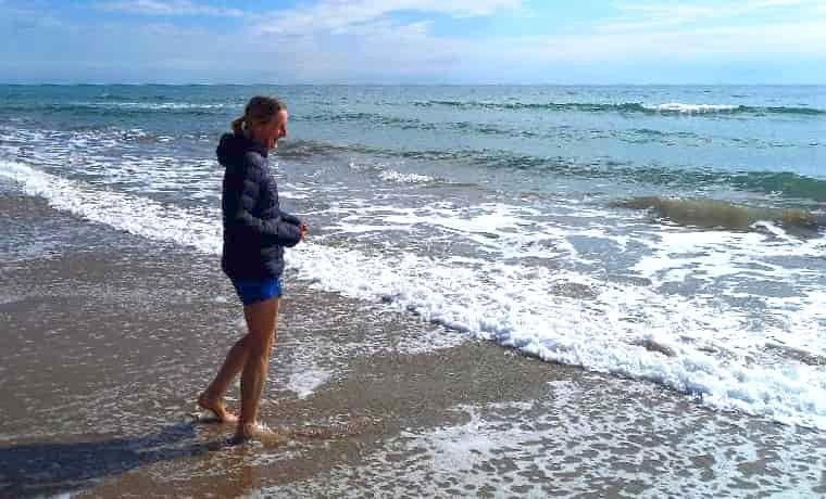 Woman standing in the sea