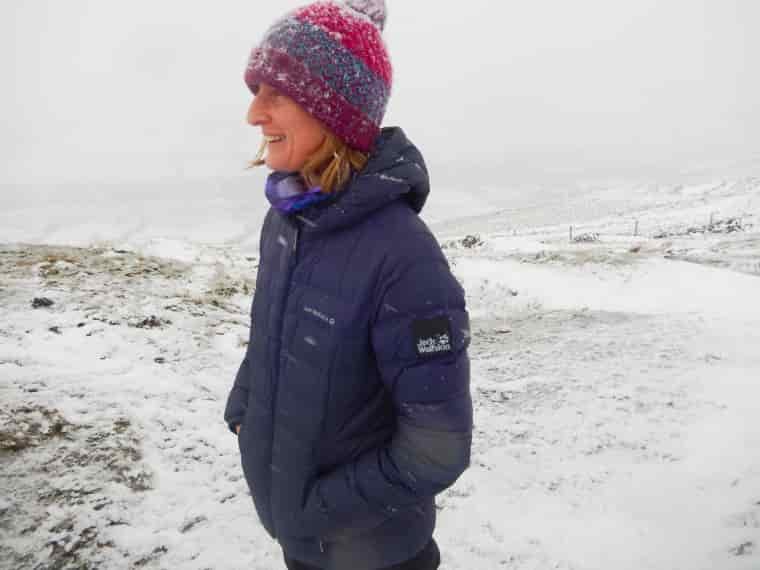 Woman standing in the snow