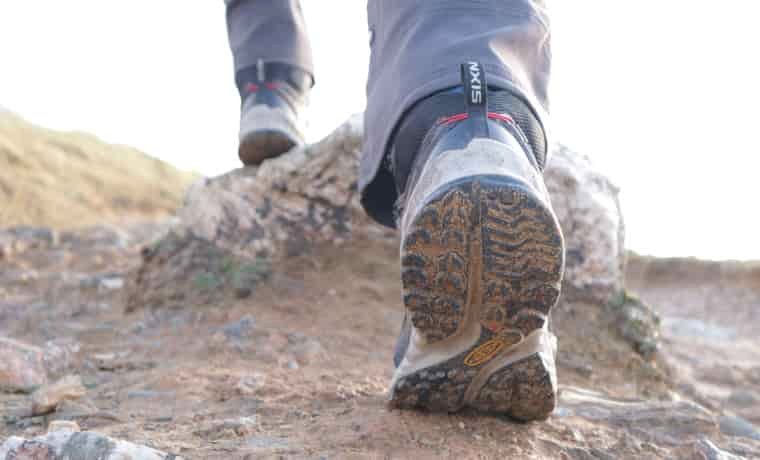 Soles of shoes on the trail