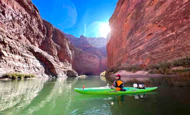 Woman kayaking in the grand canyon