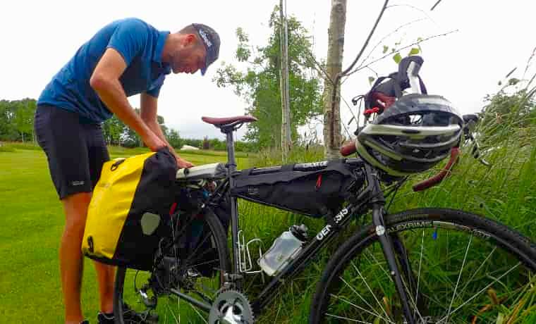 Man packing up a bike