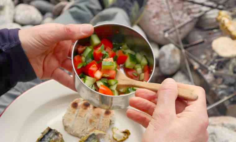Serving food with bamboo spoon