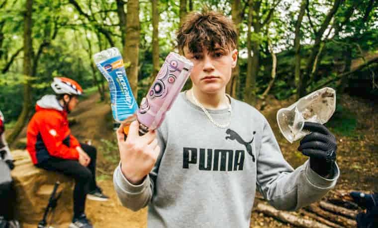 Boy holding litter