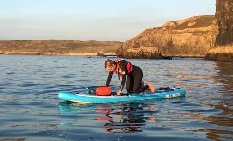 Standing up on a paddle board