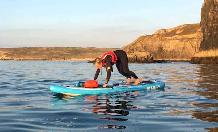 Standing up on a paddle board