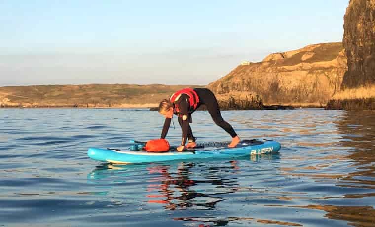 Standing up on a paddle board