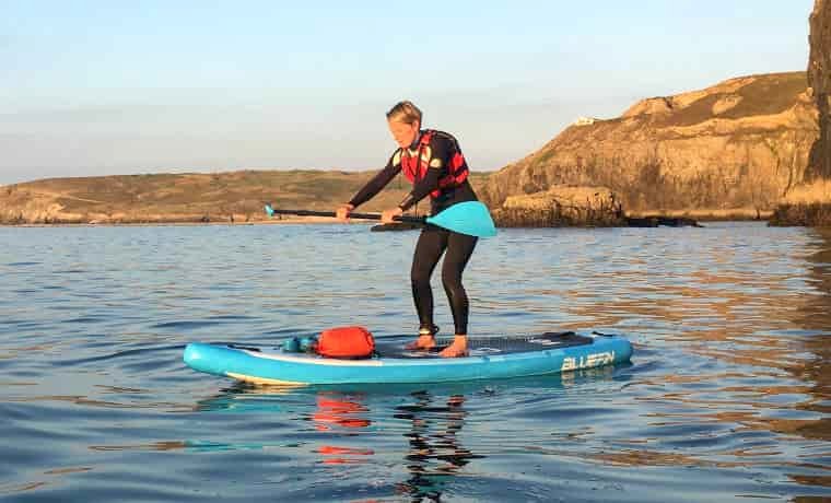 Standing up on a paddle board