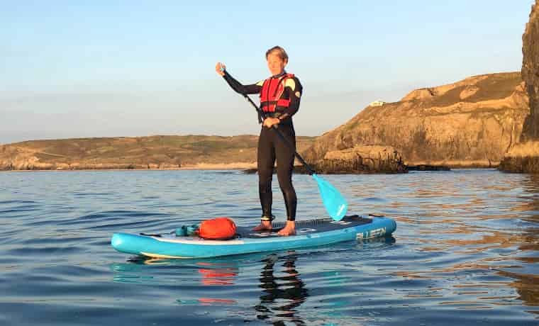 Standing up on a paddle board