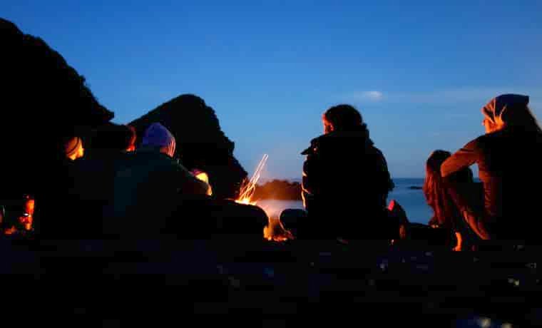 People singing campfire songs