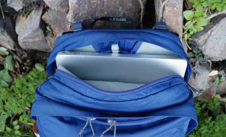 Laptop in laptop sleeve in daypack