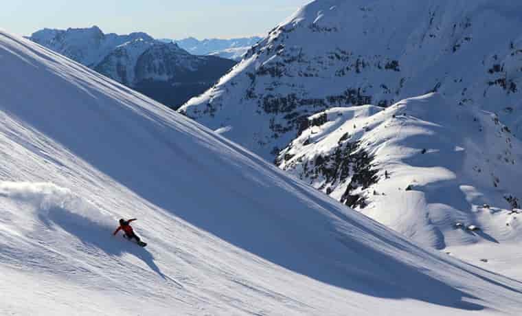 Snowboarder in mountains