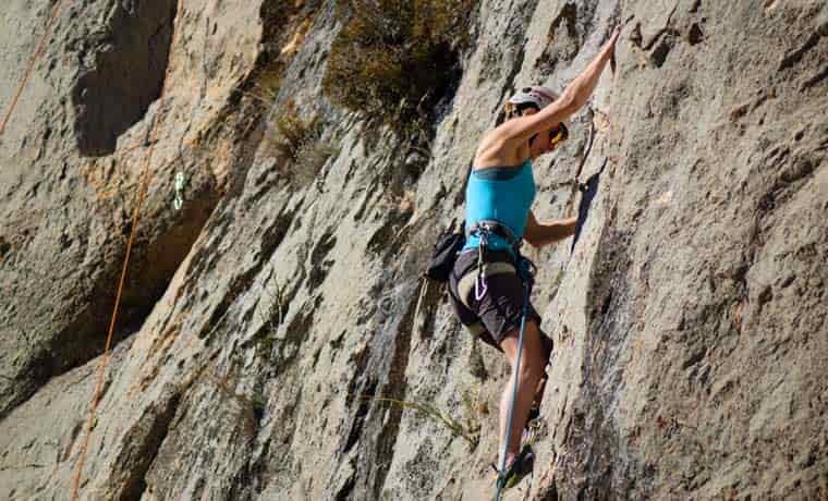 Woman rock climbing